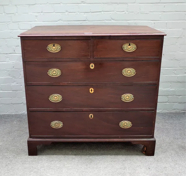 A George III mahogany chest of two short and three long graduated drawers on bracket feet, 100cm wide x 97cm high.