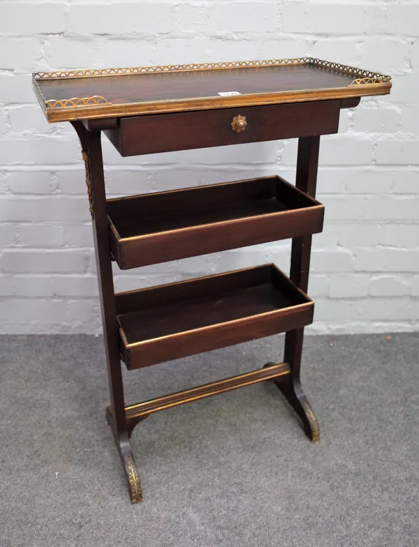 A 19th century French gilt metal mounted mahogany three tier plant stand/ what-not with single drawer, 55cm wide x 80cm high.