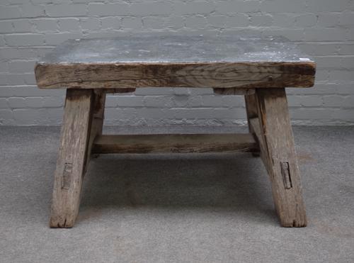 A metal topped bleached oak rectangular work bench/coffee table on heavy square supports, 99cm wide x 64cm high.