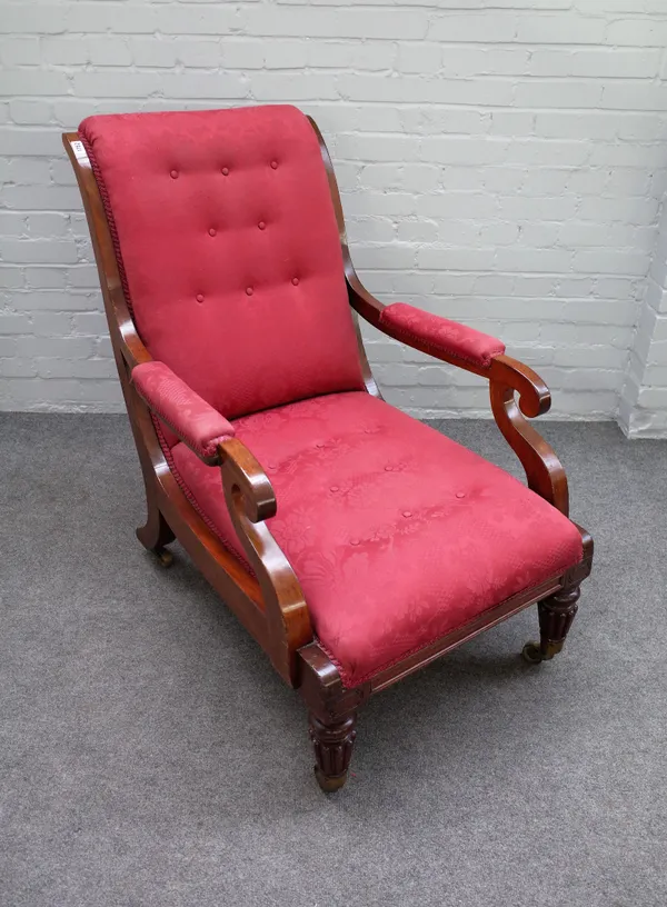 A William IV mahogany library chair with semi-padded open arms on tapering reeded supports, 65cm wide x 100cm high.