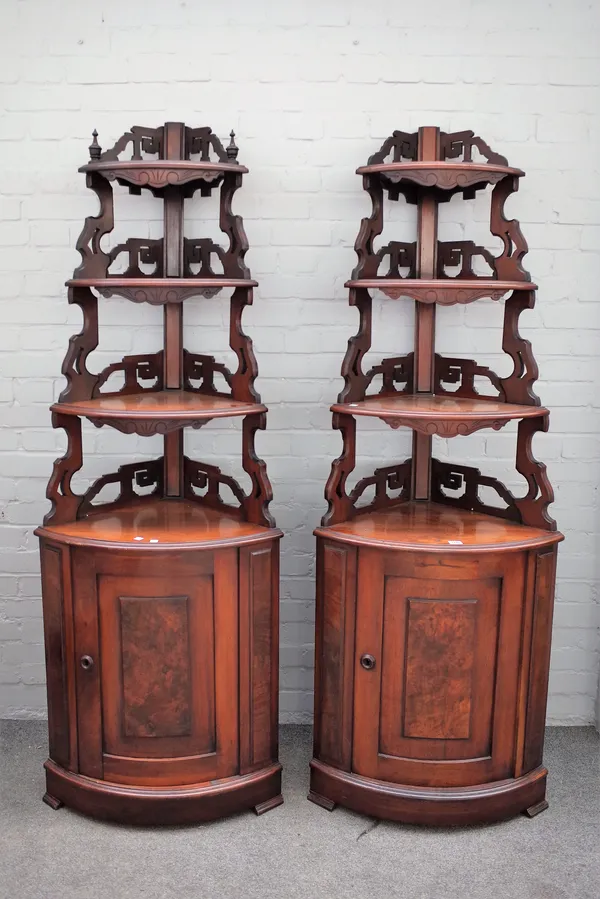 A pair of French walnut corner display shelves/cupboards, on bracket feet, 65cm wide x 197cm high (2).