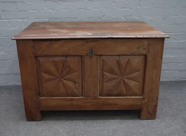 A 17th century French oak coffer, the plank top over double raised panel front on style feet 101cm wide x 68cm high.