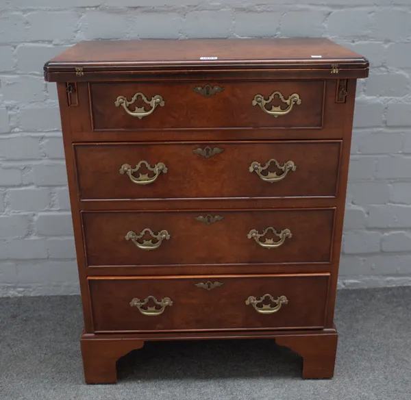 A mid-18th century style figured walnut bachelor's chest, the fold over top above four long graduated drawers on bracket feet, 60cm wide x 76cm high.