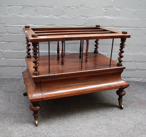 A Victorian rosewood three division Canterbury, with single drawer base on turned supports, 66cm wide x 53cm high.