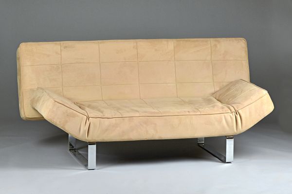 Bo Concept; a suede upholstered sofa on polished steel supports, 185cm wide x 90cm high. Illustrated.