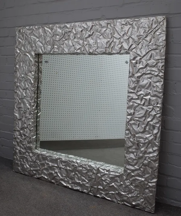 A 20th century square mirror, with crinkled polished metal frame, 120cm x 120cm.