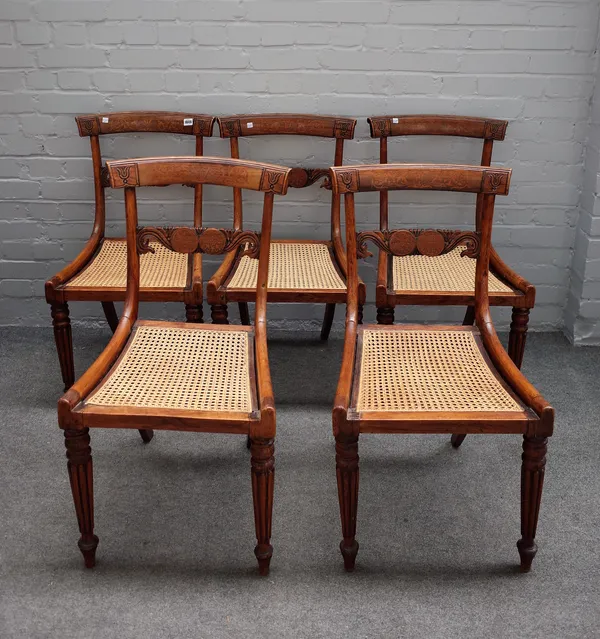 A set of six Regency faux rosewood painted dining chairs, with carved waist rail on reeded supports, 46cm wide x 83cm high (6).