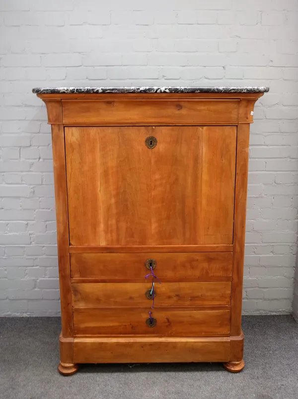 An early 19th century Continental fruitwood secretaire a abattant, the marble top over single drawer, fitted interior and three further long drawers,