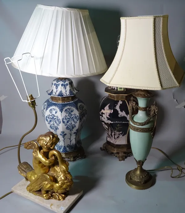 Lighting, comprising; two 20th century Asian table lamps, with gilt metal mounts, 65cm high, a 20th century George III table lamp, formed as a cherub