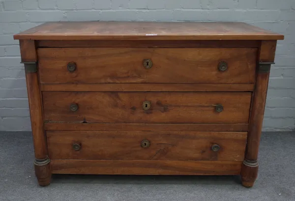 An early 19th century Continental gilt metal mounted walnut three drawer commode with split column mounts, 124cm wide x 84cm deep.