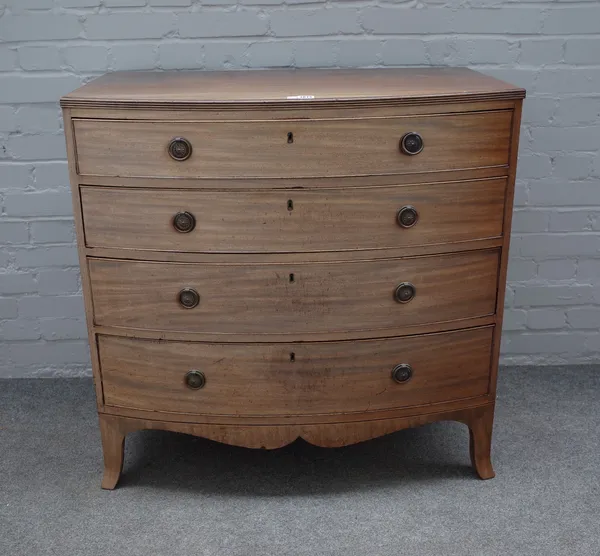 A Regency mahogany bowfront chest with four long graduated drawers on splayed bracket feet, 91cm wide x 91cm high.