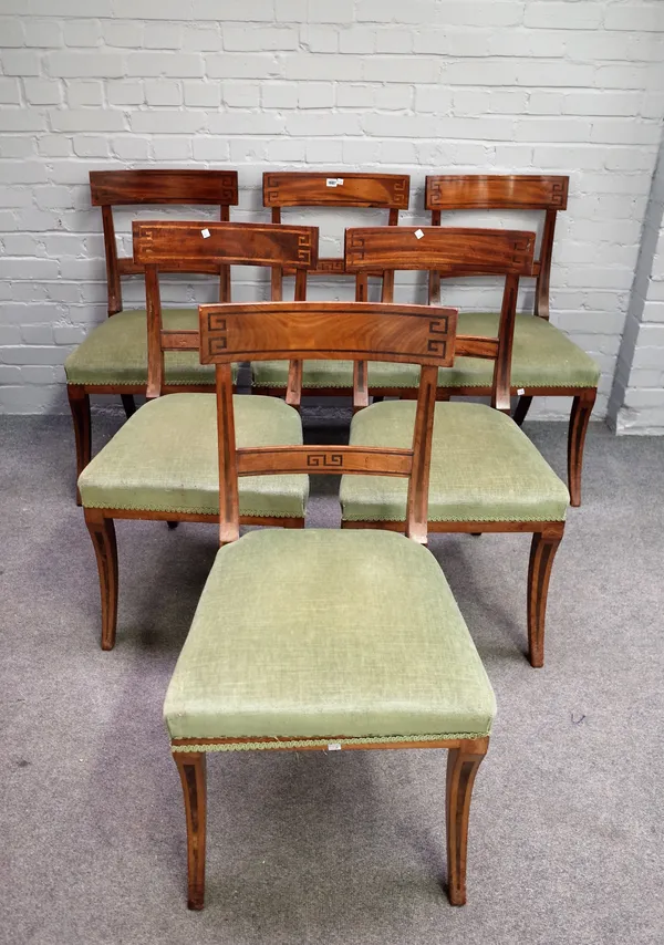 A set of six Regency inlaid mahogany bar back dining chairs, on sabre supports, 49cm wide x 88cm high, (6).