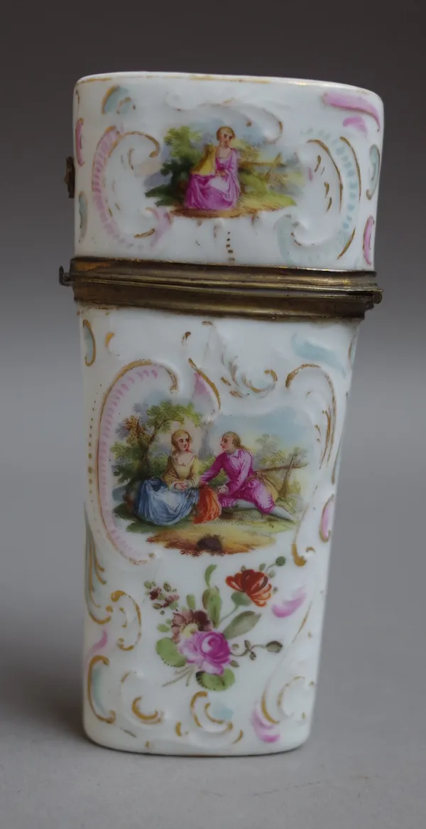 A German porcelain gilt-metal mounted etui, late 19th century, painted with panels of courting couples and flowers, 10.5cm. high.