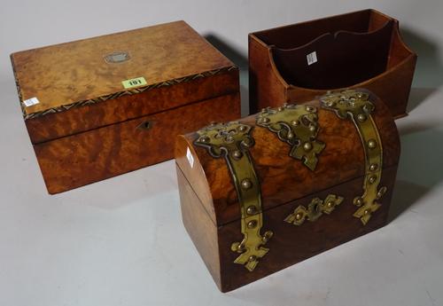 A Victorian walnut and brass bound domed box, 23cm wide x 17cm high, a Victorian burr walnut and mother-of-pearl inlaid writing slope 30cm wide x 13cm