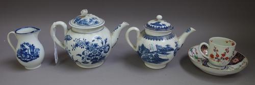 A group of English blue and white printed porcelains, late 18th century, comprising; a Worcester `Three Flowers' pattern teapot and cover; a Worcester
