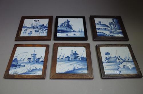A group of six blue and white delftware tiles, probably Liverpool, circa 1750-70, one painted with figures skating on ice, the others with landscape v