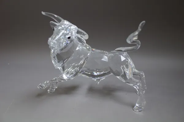 A Swarovski crystal bull, circa. 2004, Ltd edition No. 07815/10000, 25cm wide, with certificate.