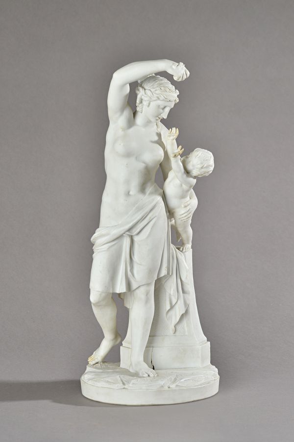 A Paris (Nast) biscuit figure group of Venus and cupid, early 19th century, the goddess standing with right arm raised and with with left arm around a