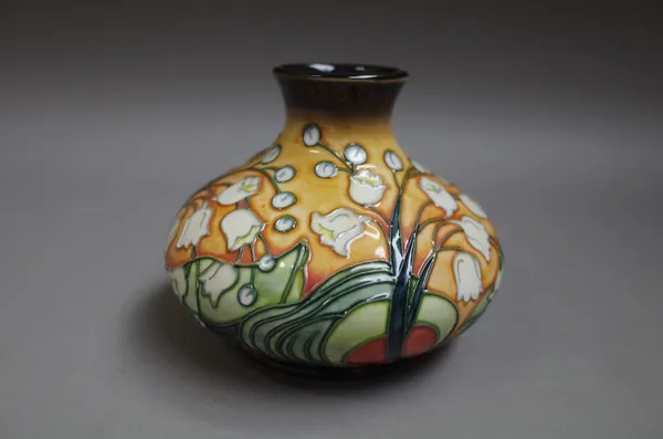 A modern Moorcroft vase by Rachel Bishop, circa. 2000, Ltd edition 78/500, foliate decorated against an orange ground, printed and painted marks, 11cm