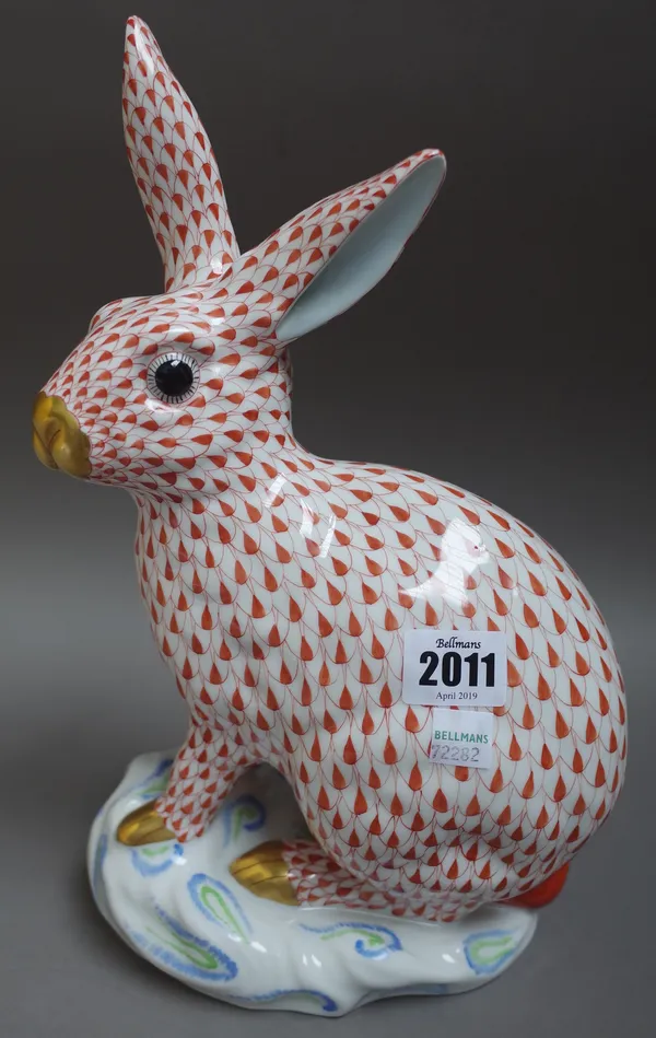 A Herend porcelain rabbit, gilt red decoration, blue printed mark, 30cm high.