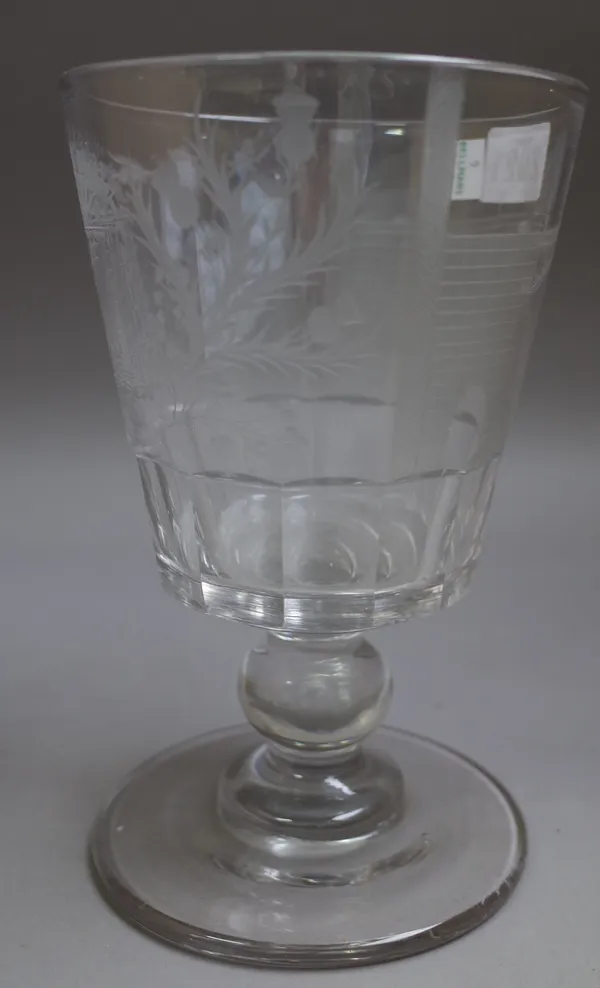 A `Sunderland Bridge' engraved glass goblet, 19th century, the bucket bowl, engraved on one side with a ship beneath the bridge, the reverse engraved