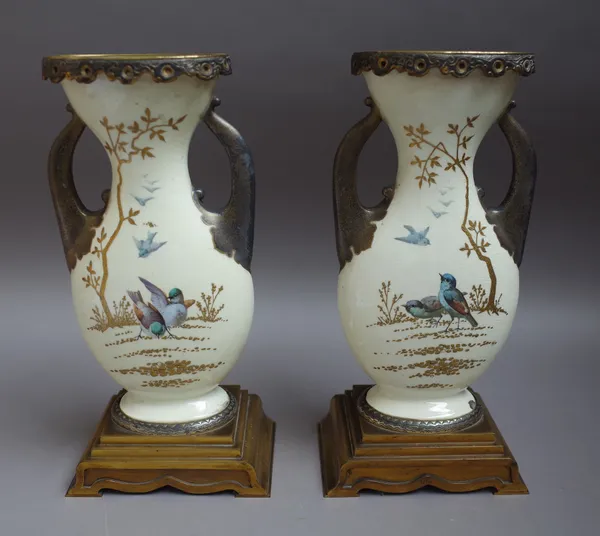 A pair of earthenware Japanesque gilt-metal mounted two-handled vases, late 19th century, each of flattened baluster form, painted with a Japanese man