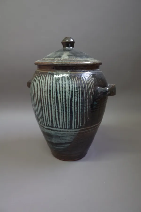 Clare Sutcliffe (1943-2019) a large lidded jar with slip decoration under ash glaze, makers mark, 40cm high.