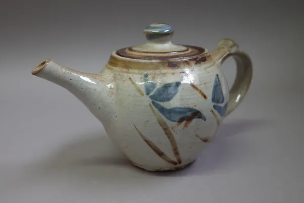 Wenford Bridge, a teapot, woodfired iron and cobalt under tin glaze, Wenford Bridge and makers mark, possibly thrown by Seth and decorated by Clare.