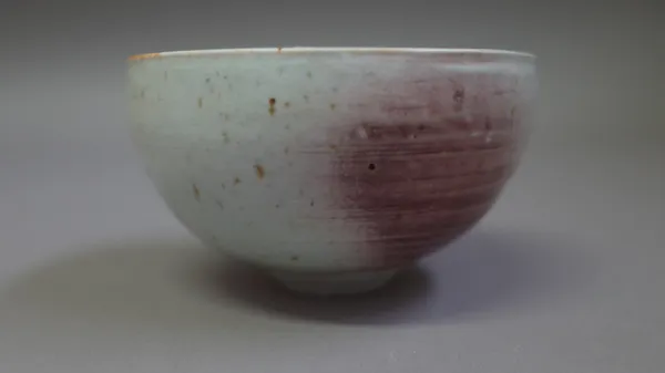 Derek Davis (1926-2008), a tea bowl, porcelain with sang de boeuf blush, 1970s, signed, 11cm diameter.