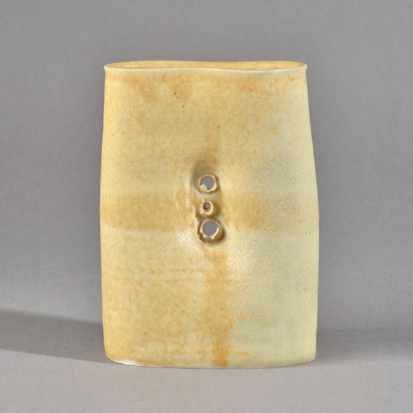 Eileen Lewenstein (1925-2005); an ochre glazed porcelain vase, 17.5cm high.  DDS Illustrated.