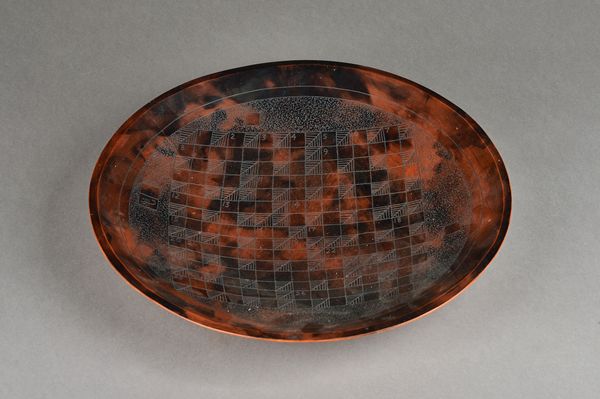 Siddig El Nigoumi (1931-1996); an earthenware dish dated 1979, 38cm diameter. Illustrated.