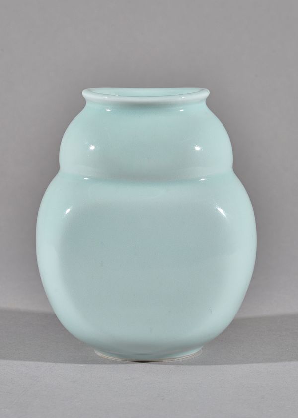 Poh Chap Yeap (1927-2007); a celadon glazed vase, 15cm high. Illustrated.