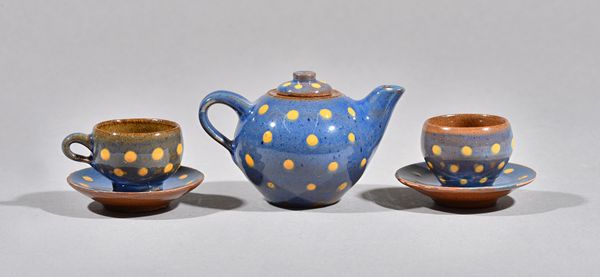 Douglas Zadek (1913-1995), a miniature teaset, coloured slip decorated earthenware, Cobham Pottery, makers mark, teapot 7cm high, (18).  Illustrated.