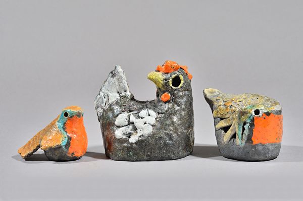 Rosemary Wren (1922-2013), three raku birds comprising two robins and a hen, with makers mark, (a.f.), 14cm high (3). DDS Illustrated.