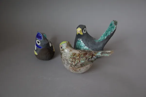 Rosemary Wren (1922-2013), three raku birds comprising a blackbird, finch, and a blue jay, with makers mark (a.f.), 8cm high, (3).  DDS