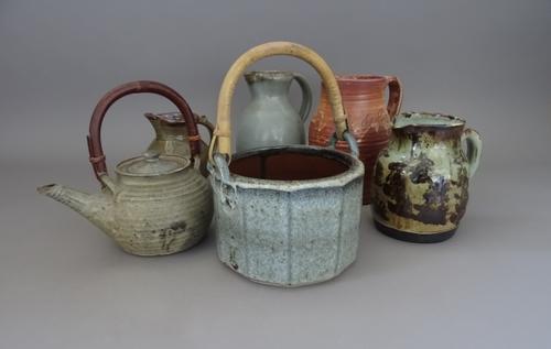A group of ceramics including a Molly Curley teapot, two jugs and one jar, 22cm high (4).