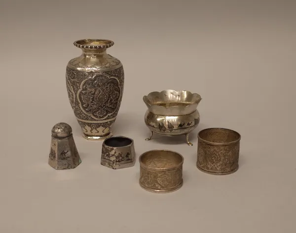 A group of Persian wares, comprising; a vase of baluster form with floral decoration, height 13cm and two napkin rings and also niello wares, comprisi