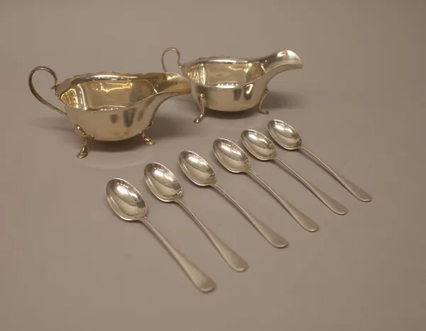 Silver, comprising; two sauceboats, Sheffield 1945 and 1939, five rat tail pattern teaspoons, Birmingham 1915 and another similar teaspoon Birmingham