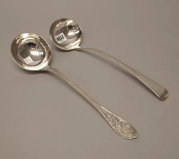 A George III silver Old English pattern soup ladle, London 1813 and a Victorian silver soup ladle, with cast decoration, London 1855, combined weight