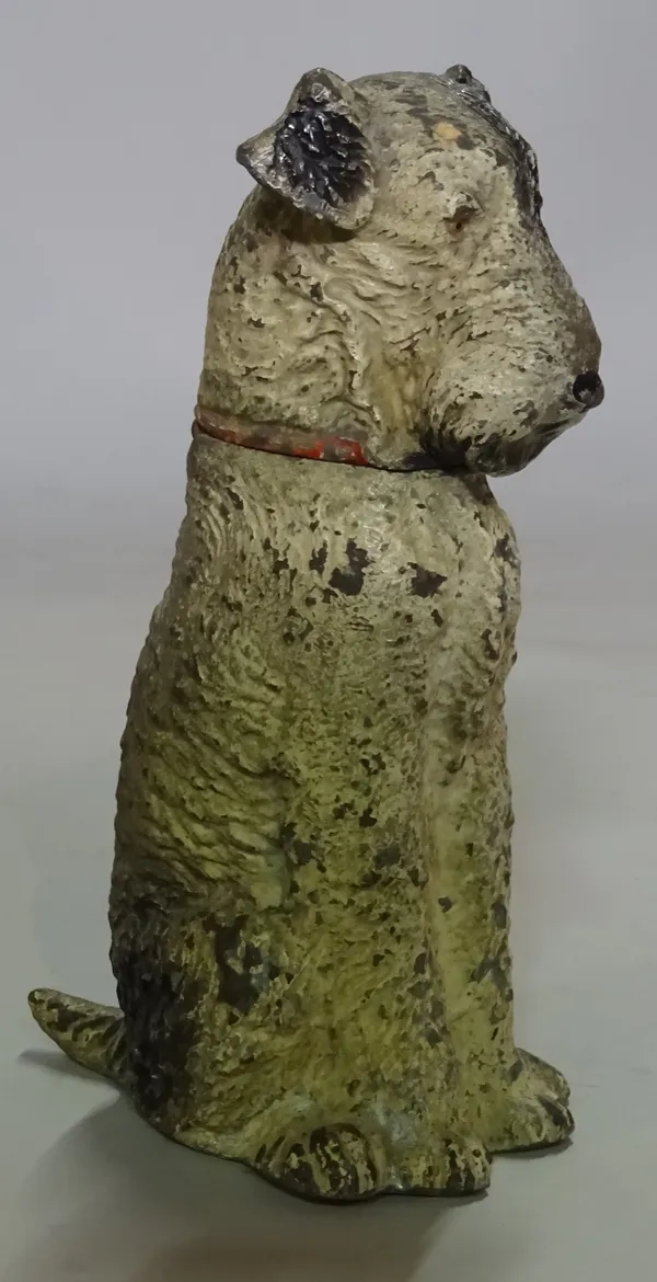 A novelty spelter terrier (Airedale) table lighter, 14cm high.