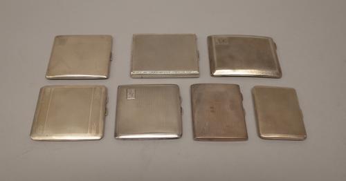 Silver, comprising; a rectangular cigarette case, the exterior with engine turned decoration, Birmingham 1946, five further cigarette cases with engin