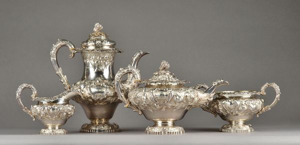 A William IV silver four piece tea and coffee set, comprising; a teapot, a coffee pot/hot water jug, a twin handled sugar bowl and a milk jug, each pi