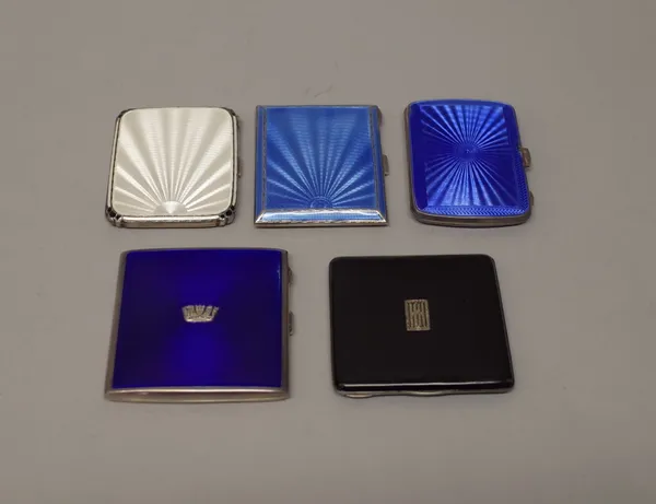 A silver gilt and blue enamelled cigarette case, the cover decorated with a navy crown motif, Birmingham 1939, a silver gilt and black enamelled cigar