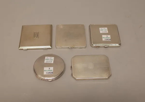 A lady's silver square powder compact, with engine turned decoration, by Asprey London, London 1933 and four further lady's silver powder compacts, al