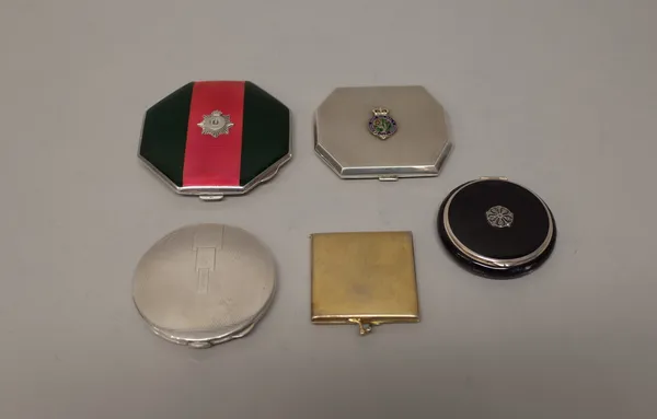 A lady's silver and enamelled octagonal powder compact, the cover applied with the badge of The Devonshire Regiment, otherwise decorated with the regi