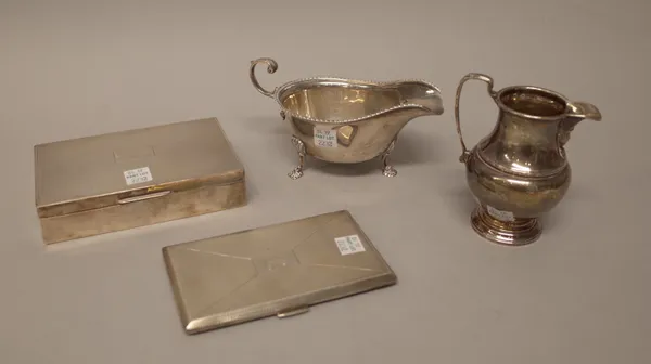 Silver and silver mounted wares, comprising; a sauceboat raised on three feet, Sheffield 1930, a milk jug, Birmingham 1932, a cigarette case, with eng