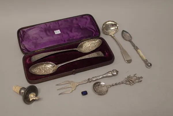 A pair of silver serving spoons, with later floral and foliate embossed decoration, London 1806, with a fitted case, a Scottish silver fiddle pattern