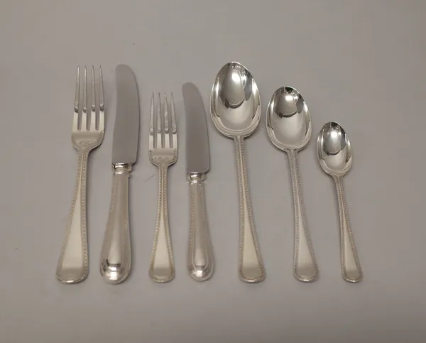 A mostly late Victorian silver feather edged Old English pattern part table service of flatware for twelve place settings, comprising; twelve table sp