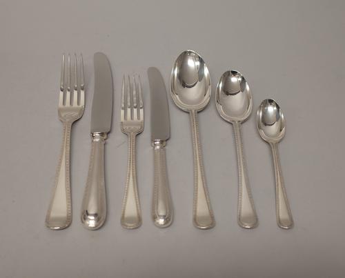 A mostly late Victorian silver feather edged Old English pattern part table service of flatware for twelve place settings, comprising; twelve table sp