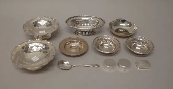 Silver, comprising; a pair of shaped circular bonbon dishes, decorated with pierced borders, Sheffield 1936, a pair of circular bonbon dishes, having